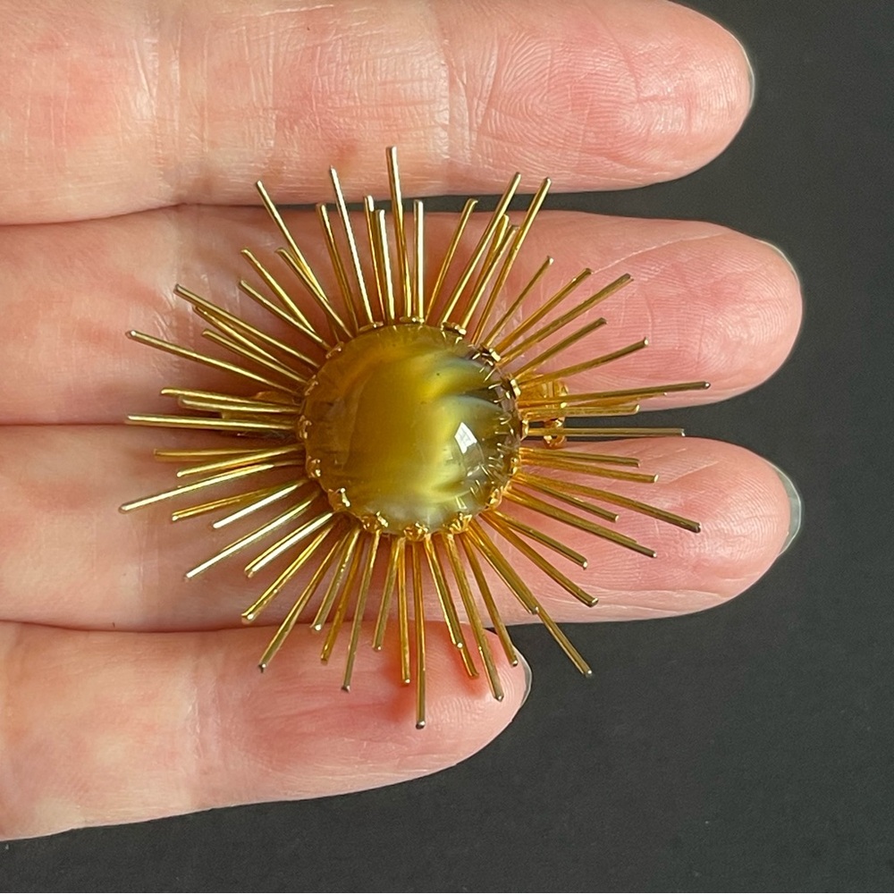 Vintage Austria signed porphyry art glass starburst Brooch.